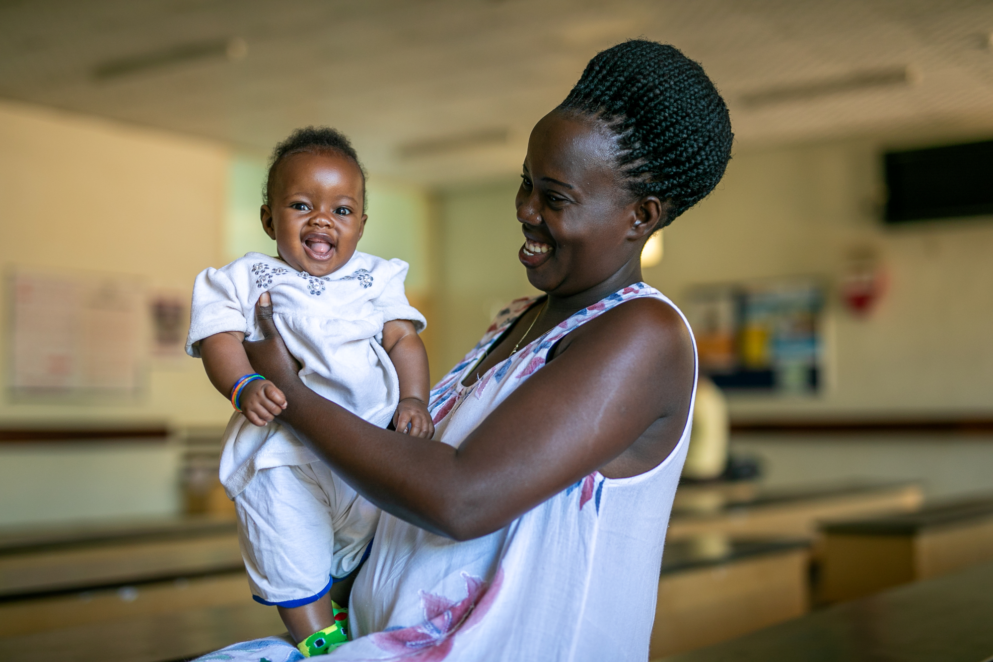 Nakanyike Annet waits with her baby Natasha Kwagala, 3 months, for immunizations at the Nakaseke General Hospital in Nakaseke District, Uganda, on September 8, 2023.