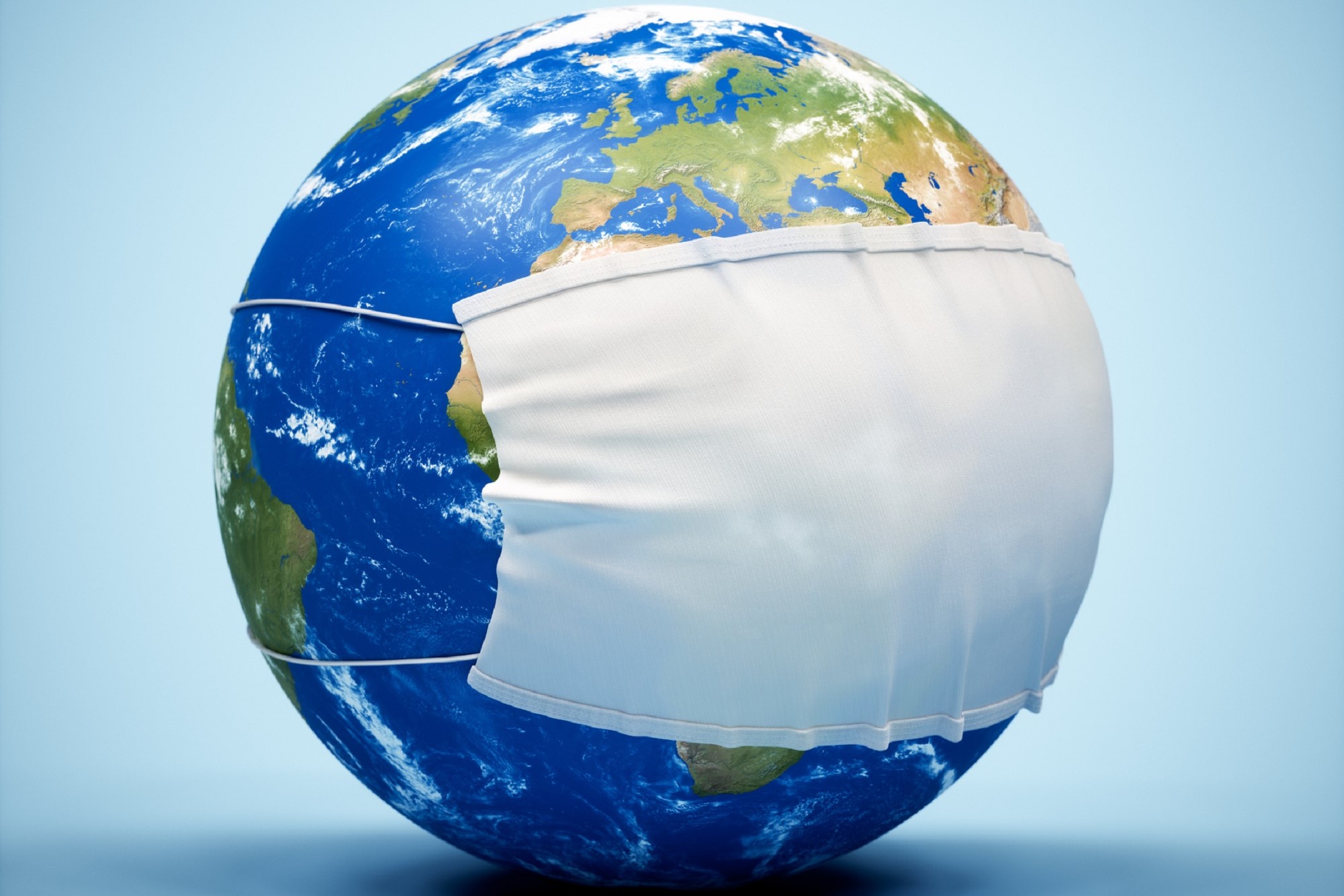 A world globe wearing a medical mask