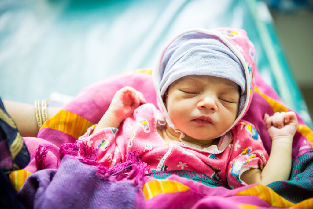 A newborn inside the maternity ward of the district hospital in Ichhawar, Sehore District, Madhya Pradesh, India 