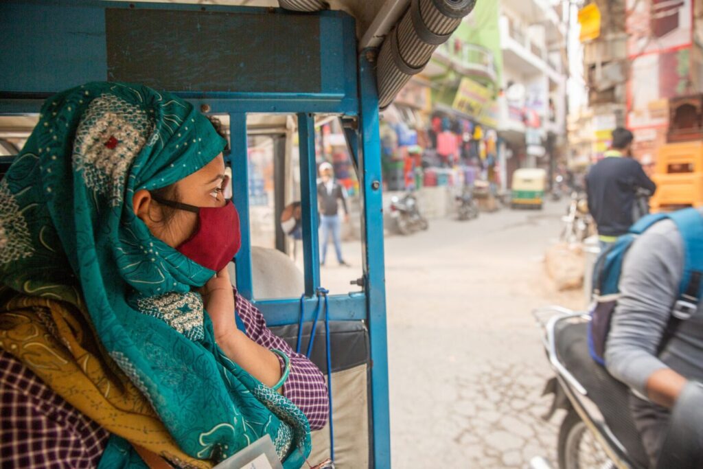 Sangam Devi makes her way home in an auto rickshaw after attending a teachers training program in New Delhi, India, on February 18, 2021. Sangam's new employment status has given her great encouragement and confidence to go about her daily life.